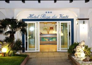 a front door of a hotel with a sign on it at Hotel Rosa dei Venti in Castelsardo