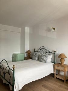 Tempat tidur dalam kamar di Casa da Nazaré