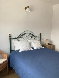Tempat tidur dalam kamar di Casa da Nazaré