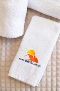 a towel with a picture of a bird on it at #114 Ocean and Marina View with AC in Albufeira