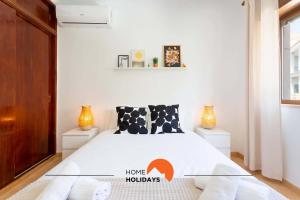 Postel nebo postele na pokoji v ubytování #114 T2 Foxy H by Home Holidays + 37 fotografií