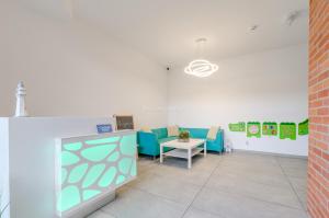 Posezení v ubytování Villa Łeba Pokoje & Apartamenty