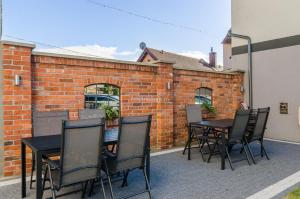 Patio nebo venkovní prostory v ubytování Villa Łeba Pokoje & Apartamenty
