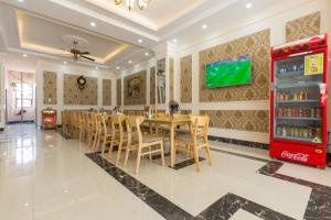 TV a/nebo společenská místnost v ubytování Biển Vàng Vũng Tàu Hotel