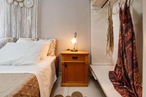 Postel nebo postele na pokoji v ubytování Aria Apartment + 17 fotografií