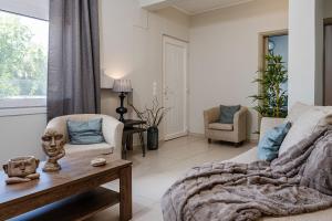 Posezení v ubytování Aria Apartment