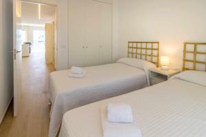 Posteľ alebo postele v izbe v ubytovaní Port de Llançà 29 Apartamento con vistas al mar
