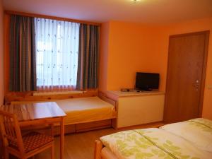 Postel nebo postele na pokoji v ubytování Haus Moser