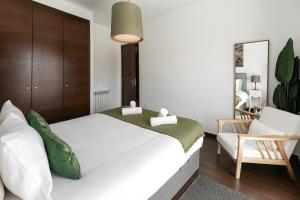 Ένα ή περισσότερα κρεβάτια σε δωμάτιο στο Baleal Deluxe Flat +18 φωτογραφίες