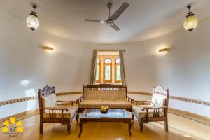 Postel nebo postele na pokoji v ubytování Hotel Golden Haveli