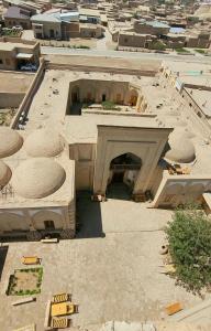an overhead view of a building under construction at madrasah Polvon-Qori boutique hotel in Khiva