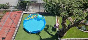 an overhead view of a play area with a tree at Villa Elia in Kavala