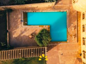 Bazén v ubytování Hotel Golden Haveli nebo v jeho okolí
