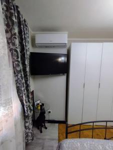 TV a/nebo společenská místnost v ubytování Tivoli Mood House