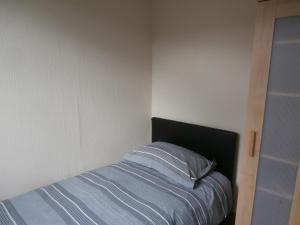 En eller flere senge i et værelse på Inviting 2-Bed Chalet in Mablethorpe