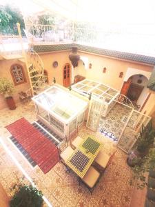 an aerial view of a building with a patio at Riad DAR BARBI in Marrakesh