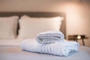 Voodi või voodid majutusasutuse Pefkon Suites toas
