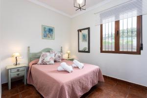 Posteľ alebo postele v izbe v ubytovaní Villa 4 Vientos + 10 fotografií