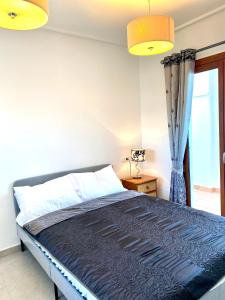Postel nebo postele na pokoji v ubytování The Penthouse
