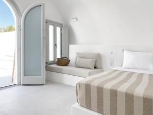 Ліжко або ліжка в номері Marousi Cycladic House with private pool