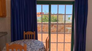 Ένα ή περισσότερα κρεβάτια σε δωμάτιο στο Apartamentos Villa Aurora +88 φωτογραφίες