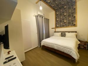 FILYS HOTEL客房内的一张或多张床位