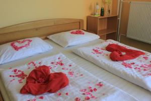Postel nebo postele na pokoji v ubytování Hotel Central