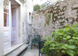 Сад в B&B Sesame Inn