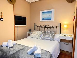 Ένα ή περισσότερα κρεβάτια σε δωμάτιο στο Apartamento El Rey
