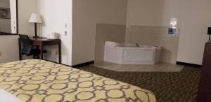 Postel nebo postele na pokoji v ubytování Baymont by Wyndham Harlan + 22 fotografií