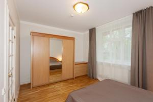 Cama o camas de una habitación en Vytauto apartamentai