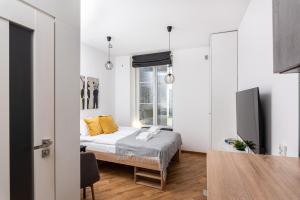 Posteľ alebo postele v izbe v ubytovaní NovaNest Apartments - Kalwaryjska - by Upstairs