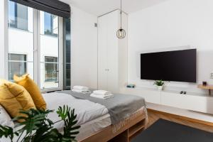 Televízia a/alebo spoločenská miestnosť v ubytovaní NovaNest Apartments - Kalwaryjska - by Upstairs