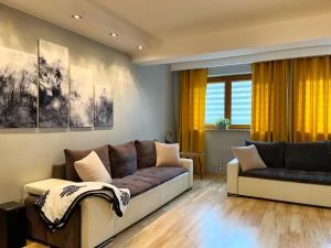 Posedenie v ubytovaní Apartament Wilcza Jama z kominkiem - Viva pod Giewontem Apartamenty