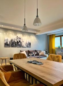 Posedenie v ubytovaní Apartament Wilcza Jama z kominkiem - Viva pod Giewontem Apartamenty