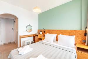 Postel nebo postele na pokoji v ubytování Mavilim Hotel