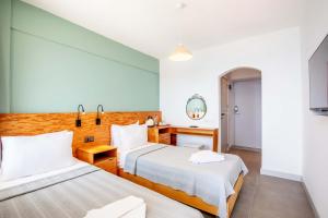 Postel nebo postele na pokoji v ubytování Mavilim Hotel