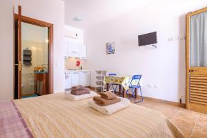 Ένα ή περισσότερα κρεβάτια σε δωμάτιο στο Mamba House 1