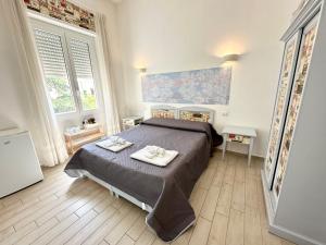 A bed or beds in a room at Vintage
