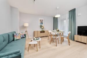 Televízia a/alebo spoločenská miestnosť v ubytovaní Central SouthStar Apartments - Gwiaździsta - FREE PARKING by Noclegi Renters
