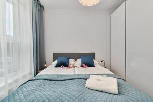 Posteľ alebo postele v izbe v ubytovaní Central SouthStar Apartments - Gwiaździsta - FREE PARKING by Noclegi Renters