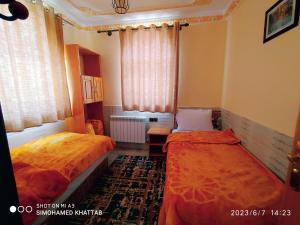 Chalets ITO Atlas Timnay客房内的一张或多张床位