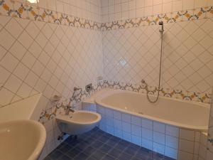 A bathroom at Holiday Home Ragusa by Interhome