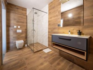 a bathroom with a sink and a shower at Holiday Home Stana by Interhome in Klenovica