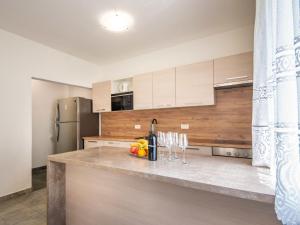 Kuchyňa alebo kuchynka v ubytovaní Holiday Home Stana by Interhome