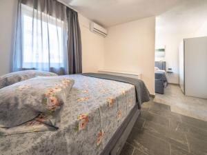 Posteľ alebo postele v izbe v ubytovaní Holiday Home Stana by Interhome