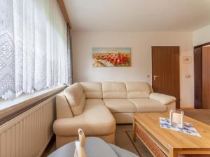 Et sittehjørne på Apartment Am Hohen Bogen-56 by Interhome