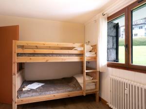Łóżko lub łóżka w pokoju w obiekcie Apartment Le Nerey-2 by Interhome