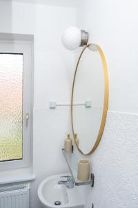 Koupelna v ubytování 2 Zimmer Ferienwohnung Am Hafen