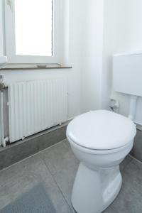 Koupelna v ubytování 2 Zimmer Ferienwohnung Am Hafen